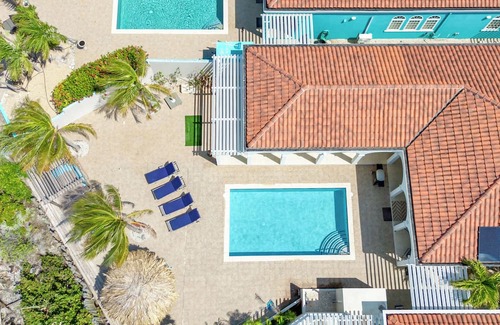 Sabadeco Haus | Crown Ridge 12 – Oceanfront home with private pool & infant of a dive site