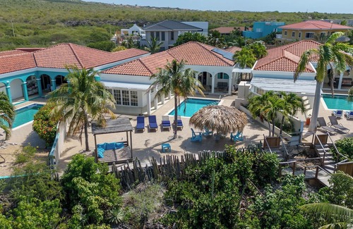 Sabadeco Haus | Crown Ridge 12 – Oceanfront home with private pool & infant of a dive site