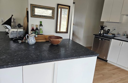 Cragsmoor Haus | A spectacular Shawangunk vista in a beautifully renovated chalet on a lush lawn.