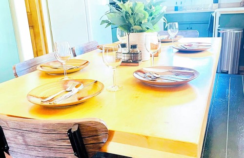 Old Station Haus | Charming 3-bedroom cabin in with AC, spa, game room, firepit & EV charger