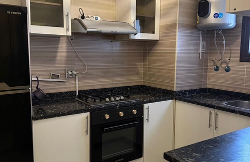 New Cairo Wohnung | Elegant Hotel Apt in Madinaty Garden View