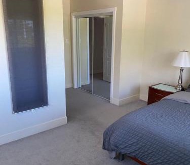 Richmond Haus | Spacious and bright queen bed room with private bathroom