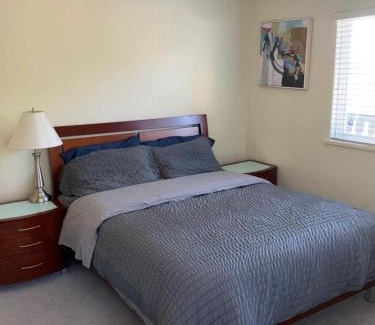 Richmond Haus | Spacious and bright queen bed room with private bathroom