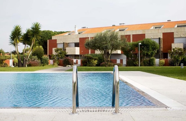 Home in condominium on the beach, with swimming pools, tennis court and garden