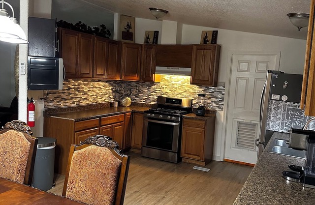 In town, fenced yard, fits a small size RV for parking only,
