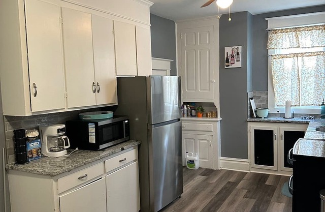 Spacious 4-bedroom home in charming historic Hagerstown, featuring WiFi and AC.