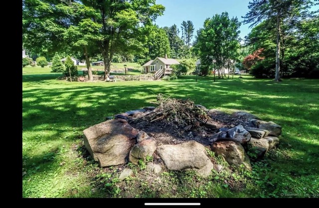 Cozy home with large deck, private river access and 1acre yard all to yourself!
