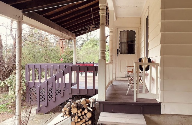 Bohemian Glow, this cozy home is surrounded by birds and a wildlife habitat.