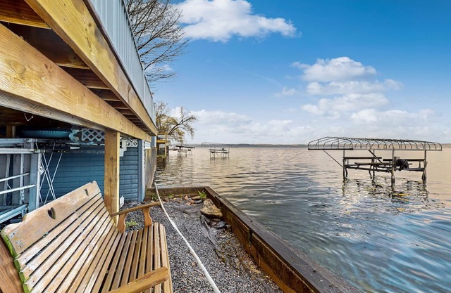 Lakefront home with private dock, lake views, deck, grill, streaming, & 1 kayak