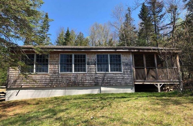 Camp Jim - on Rangeley Lake with large dock, kayaks, and screened porch!