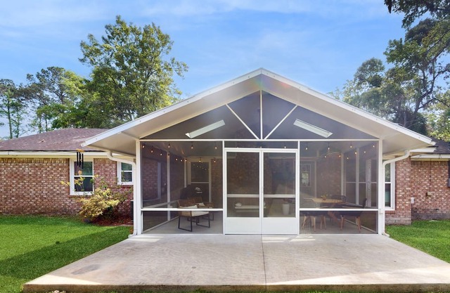 Updated dog-friendly home with screened porch, children's items, & pellet grill