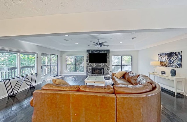 Gorgeous pond view home with two porches, streaming, & W/D - great location