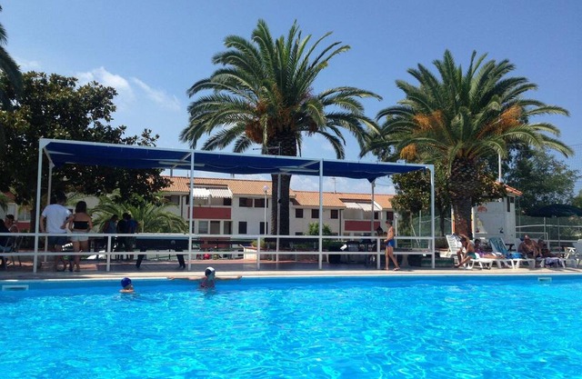 Holiday Apartment "Trilocale 83 Residence La Giungla" with Sea View, Shared Pool & Wi-Fi