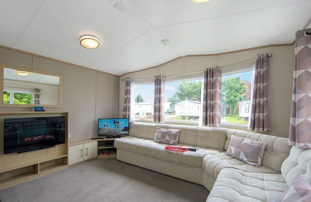Very comfortable modern and contemporary 12ft-wide caravan with one double and one twin.