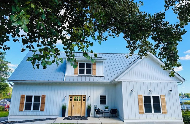 Brand new Modern, 6 bedroom waterfront home on a beautiful Long Lake.