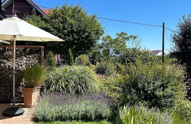 Ferienwohnung 'Garden Suite' mit Bergblick, privater Terrasse und Wi-Fi