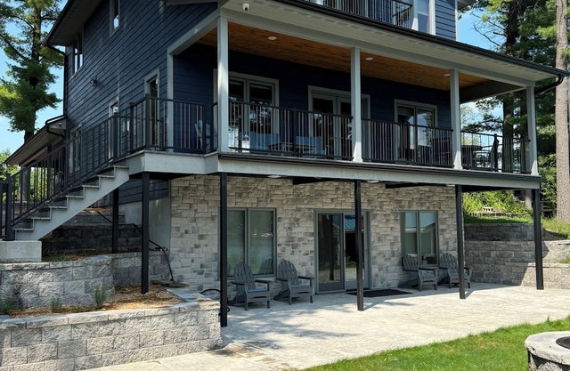 Charming new lake house with beautiful views. Pier for swimming and fishing.