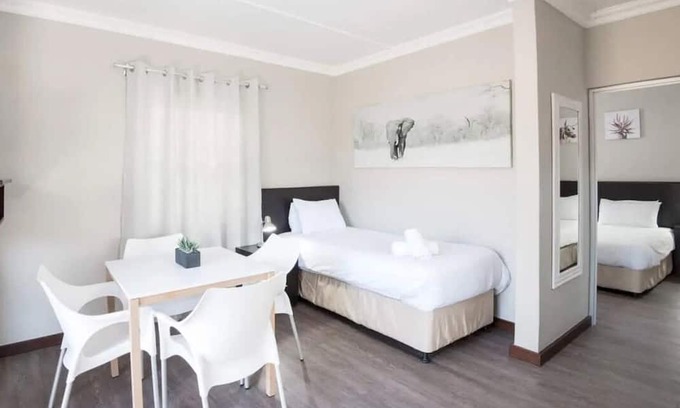 Windhoek Haus | Minutes Away from Haven Zoological Park! 2 Relaxing Chalets w/ Patio, Pool!