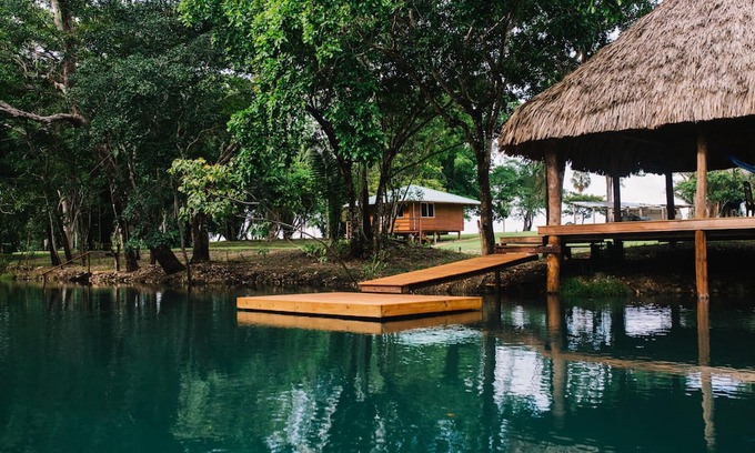 Orange Walk District Kabine | A Cozy cabin along the Rio Bravo River—bird watcher’s paradise with WiFi and AC.