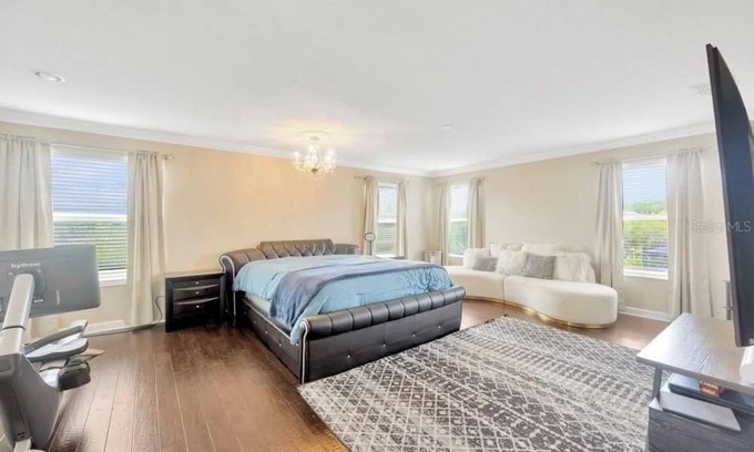 Live Oak Preserve Haus | Spacious 6 bedroom house with pool and grotto, movie theater room, AC and Wifi.