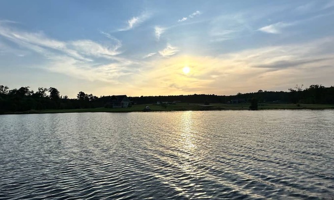 Negreet Haus | RV Cover with entertaining patio and additional storage area at Toledo Bend Lake