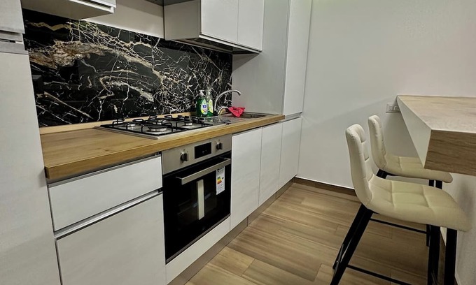 Aprilia Haus | TRENDY HOME apartment 5 minutes from the sea , and from the train station .