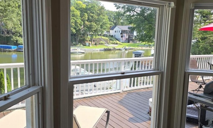 Spring Lake Haus | Waterfront home Spring Lake hot tub, firepit, gas grill fishing