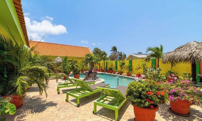 Punto de Oro Wohnung | This apartment is a 4 bedroom(s), 4 bathrooms, located in Oranjestad, null.