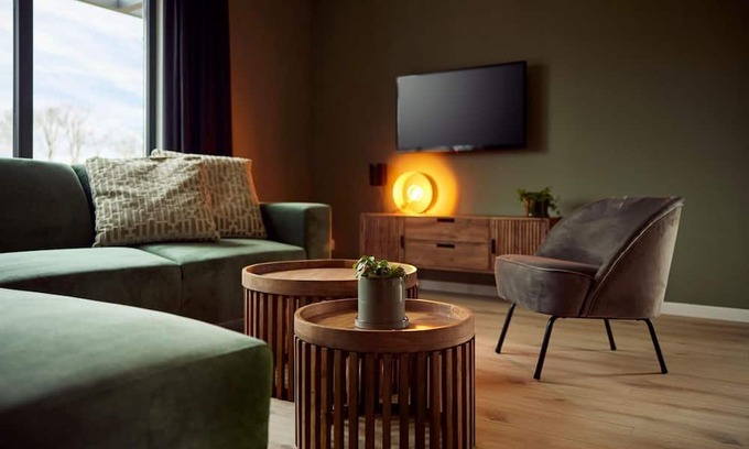 Lattrop Haus | The Amalia is a four-person holiday home and has an attractive homely living room with an open kitchen, two bedrooms and a spacious outdoor area.