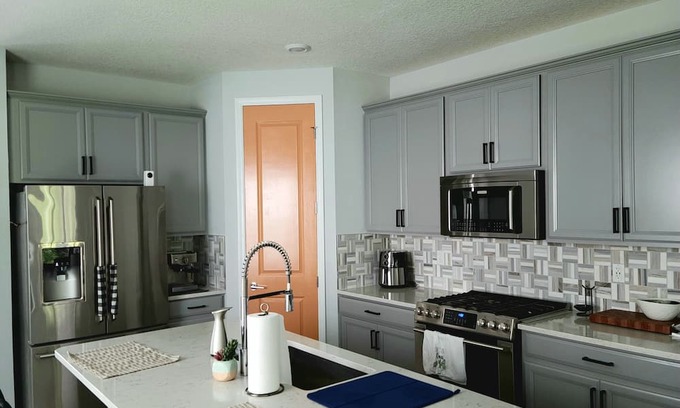 St. Johns Haus | Family home in Beachwalk with roomy common areas and private spaces for a group.