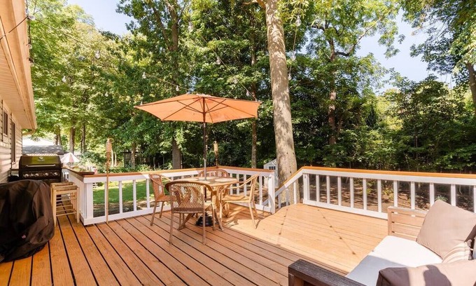 Columbus Haus | Newly remodeled home, spacious deck w/ string lights, & large yard with firepit