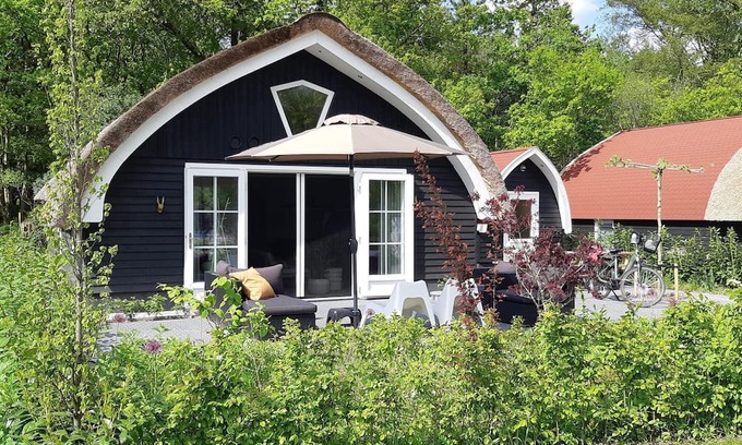 Baars Hütte | House with a terrace on the edge of the forest