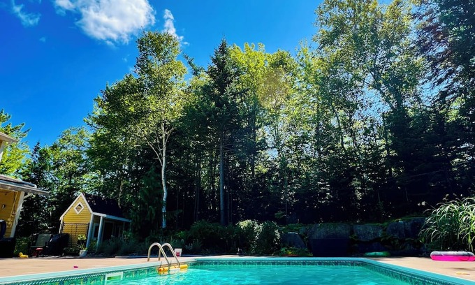 Halifax County Haus | Charming family home with in-ground heated pool. Close to parks, lakes, & trail.
