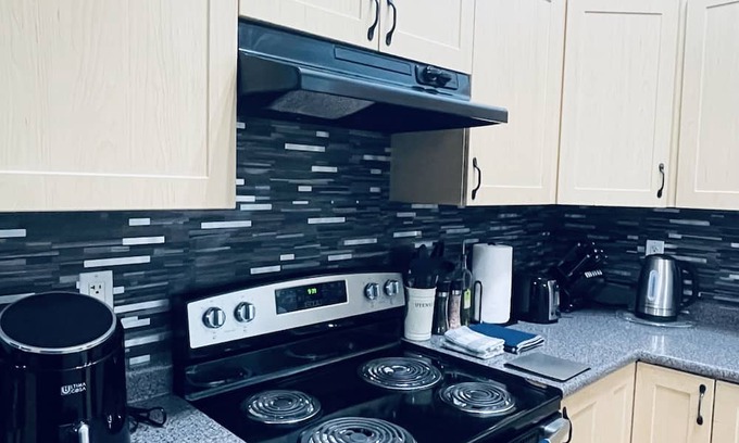 Slave Lake Haus | Modern Upper Level Duplex House Beside Convenience Store and Gasoline Station