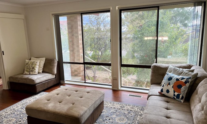 McKellar Haus | Charming 4-Bedroom Retreat with Ensuite Spa and Tranquil Backyard