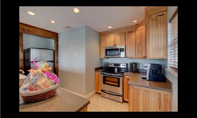 Midway Haus | Waterfront with dock, pool and boat lift, crab traps and paddle boards. Yes-Pets