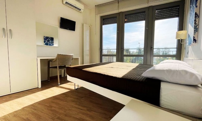 Rosate Haus | Modern master bedroom 10 minutes from highway toll booth