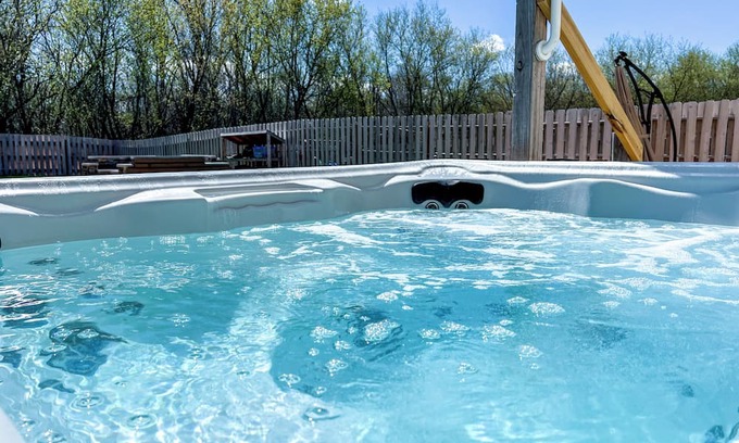 Deerfield Haus | Spacious Home + Fire Pit, Waterfall, Hot Tub, Home Theater! 20 min to DT Madison