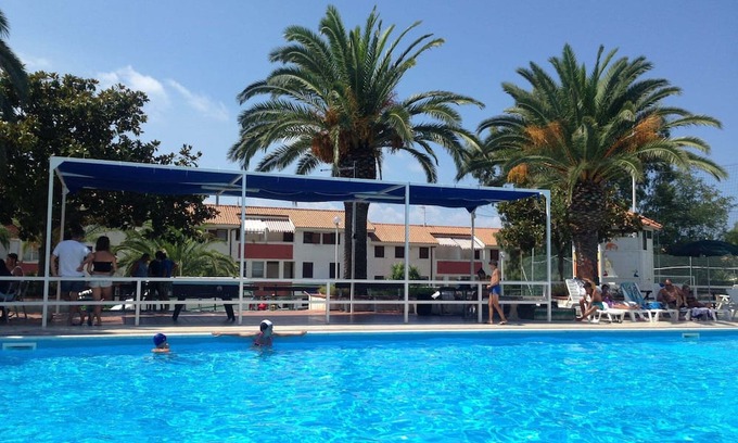 Falerna Wohnung | Holiday Apartment "Trilocale 37 Residence La Giungla" with Sea View, Shared Pool & Wi-Fi