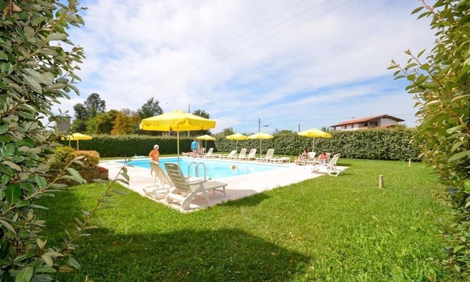 San Michele al Tagliamento Wohnung | Relaxing escape in a green oasis by Beahost Rentals