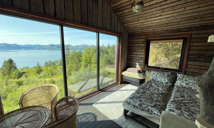 Fiskabygd Kabine | Stunning fiord panorama view off-grid forest cabin