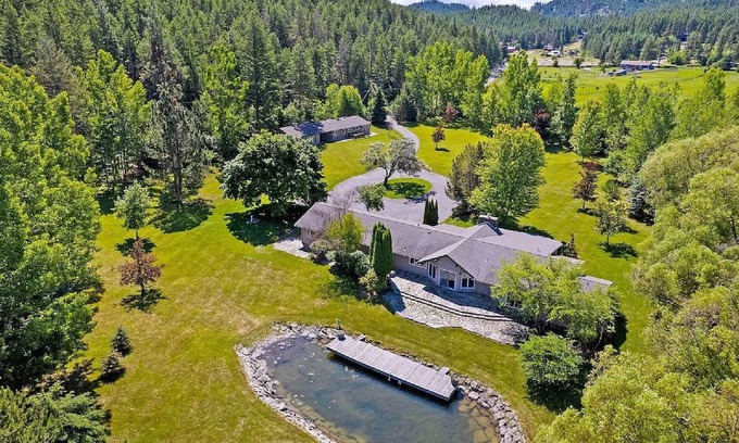 Lakeside Haus | Private Flathead Lake lagoon and dock, enjoy a spacious 5-bedroom Lakeside home.