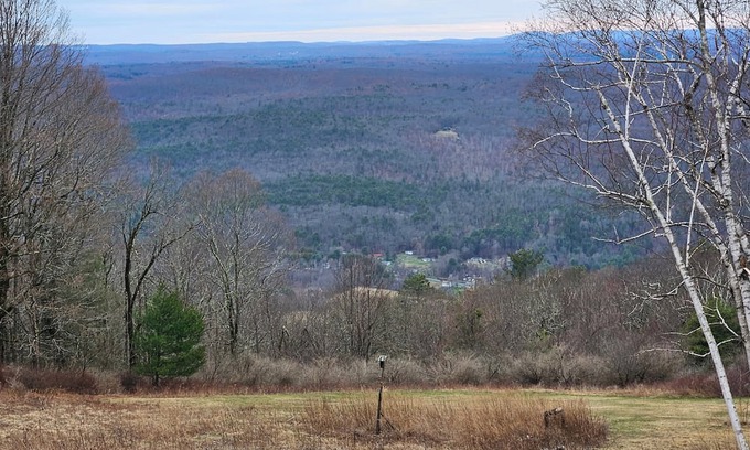 Cragsmoor Haus | A spectacular Shawangunk vista in a beautifully renovated chalet on a lush lawn.