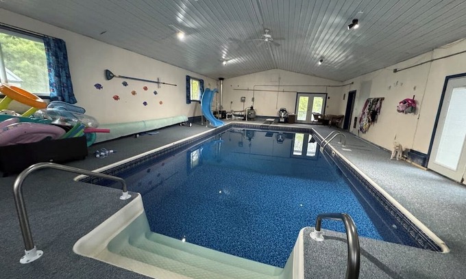 Homer Haus | Indoor pool, movie room, pool table, and more. Your Stay-cation Destination