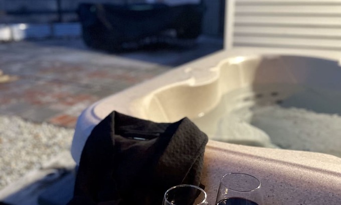 Old Station Haus | Charming 3-bedroom cabin in with AC, spa, game room, firepit & EV charger