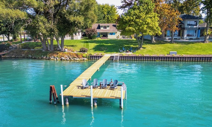 Sombra Haus | Ivy Cottage River Retreat Relax on the dock and watch the ships go by!