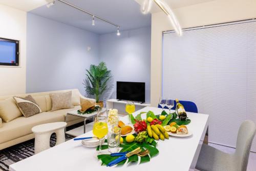 Kadena-cho Haus | オープンセール ビーチまで車で4分 駐車場2台 最大10名 ツインロッジ碧